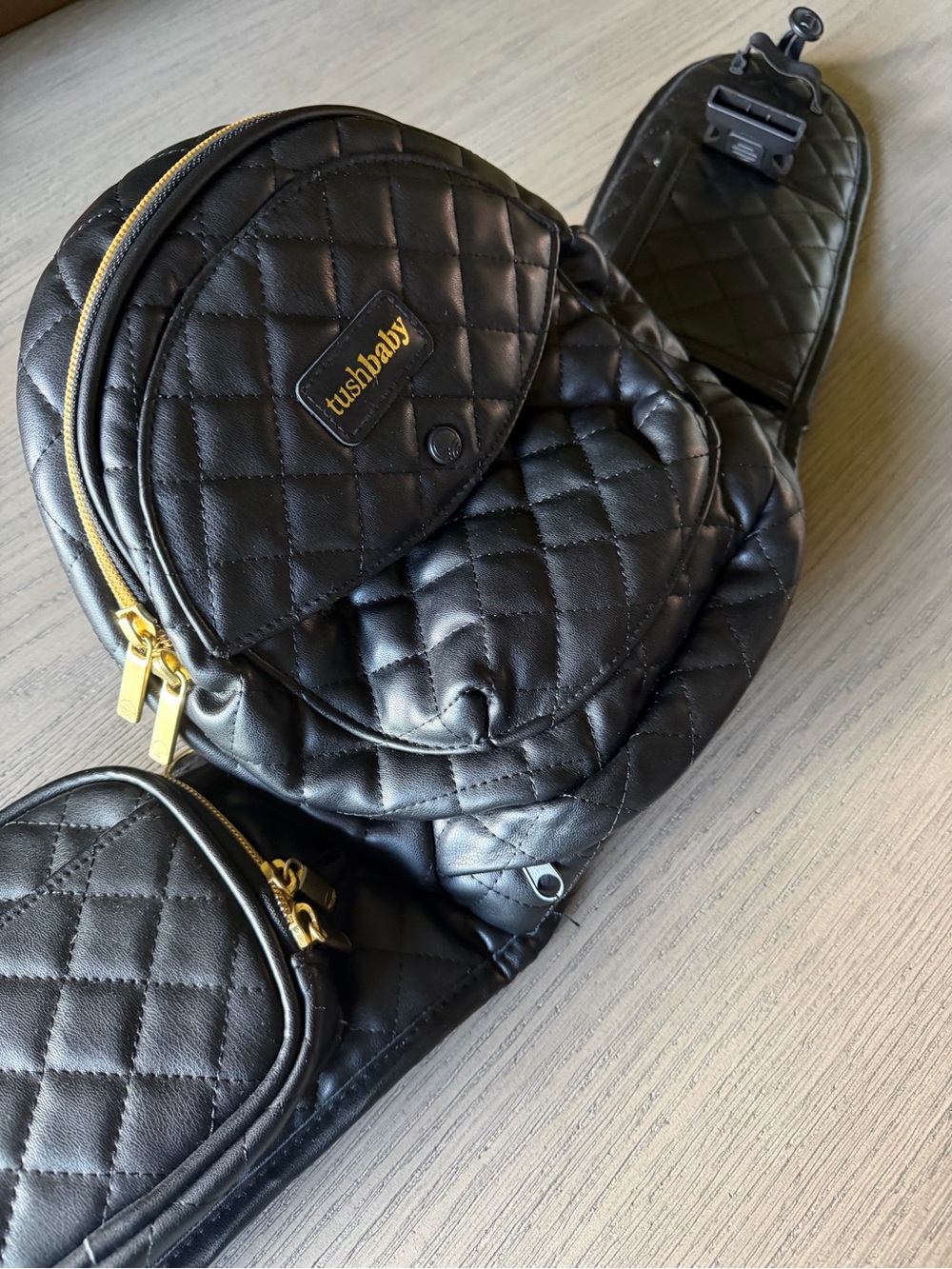 Tushbaby, Black w/ Gold Hardware
